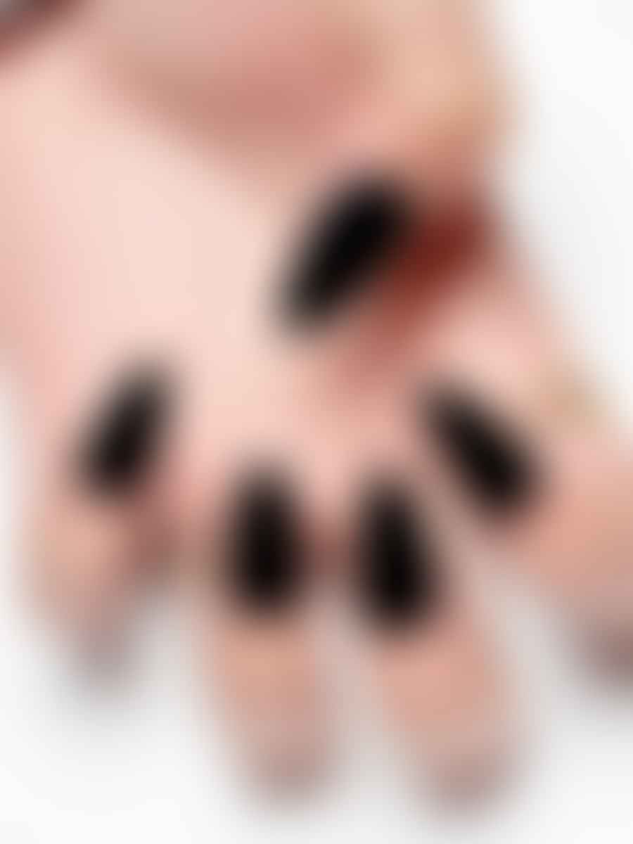 Stylish matte black short almond nails