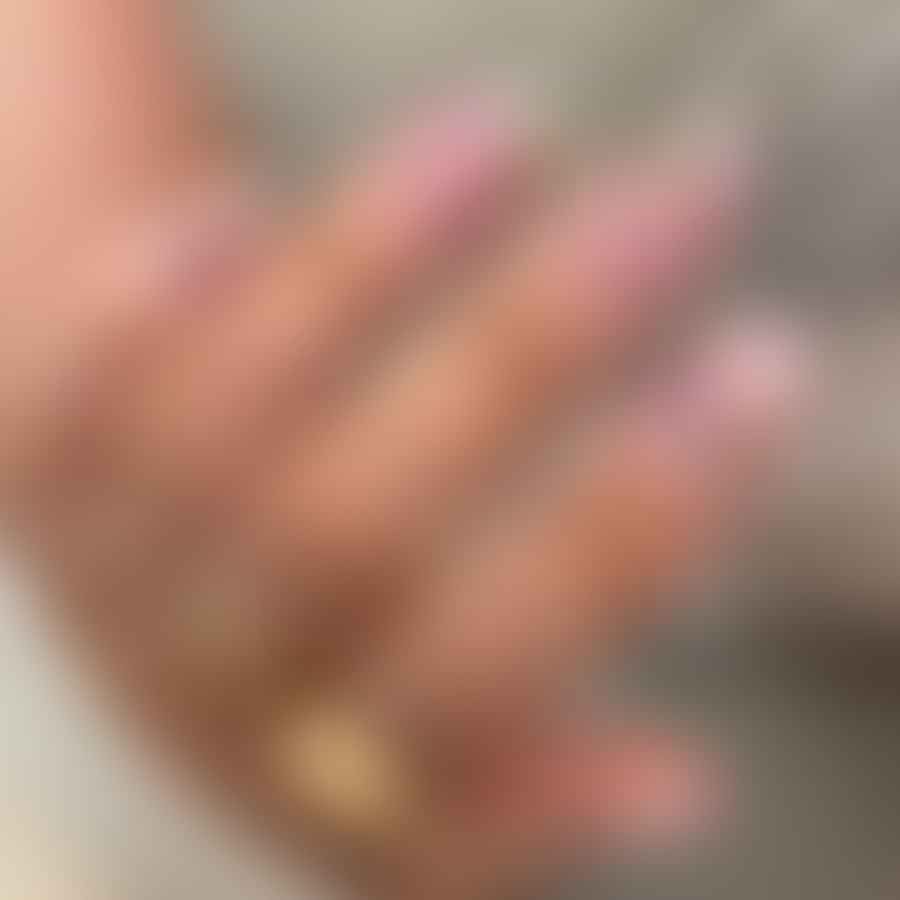 Short almond shaped nails with floral design