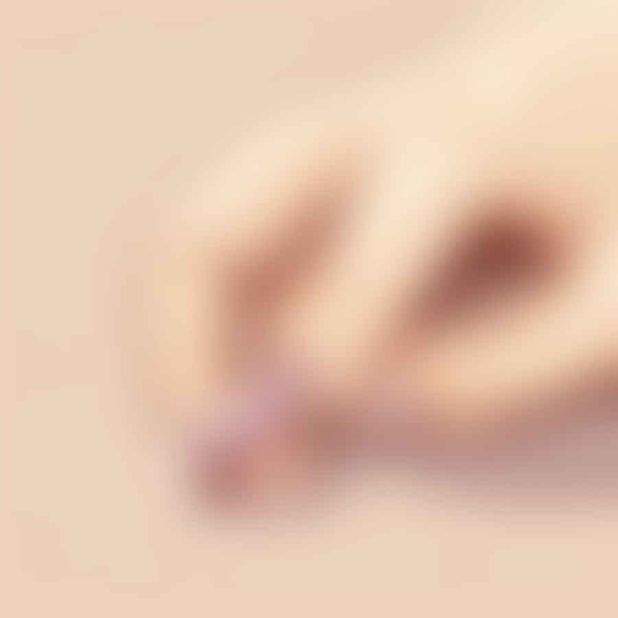 Applying base coat on short almond nails
